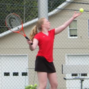 Maeve Carlson is set to serve in her singles match on May 8. KATHY ONORATO/Wiscasset Newspaper