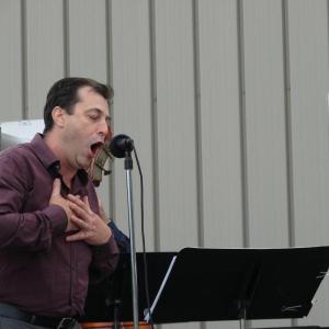 Dennis St. Pierre sings for area businesspeople at Wiscasset Municipal Airport on June 13. St. Pierre is producer of the August 6 “Wings Over Wiscasset” event. Admission is free. SUSAN JOHNS/Wiscasset Newspaper