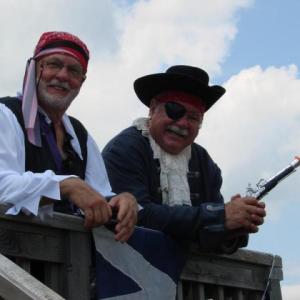 Alan Boyes, left, of Boothbay and Don Davis of Wiscasset watch July 4 festivities from the Wiscasset Yacht Club deck. SUSAN JOHNS/Wiscasset Newspaper
