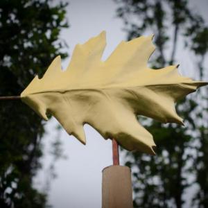 “Red Oak Leaf,” sculpted in mahogany, gold leaf, copper and cedar by John Bowdren, is part of the “Living Wood” exhibit at Coastal Maine Botanical Gardens. Curator June LaCombe will offer a walking tour on September 12. Courtesy of Frances Buerkens “Red Oak Leaf,” sculpted in mahogany, gold leaf, copper and cedar by John Bowdren, is part of the “Living Wood” exhibit at Coastal Maine Botanical Gardens. Curator June LaCombe will offer a walking tour on September 12. Courtesy of Frances Buerkens