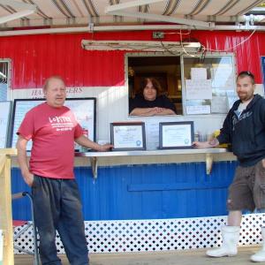 Karen’s Hideaway won Boothbay’s best hamburger and best lobster roll contest. From left are Garry Blackman Sr., Karen Blackman and Aaron Blackman. 