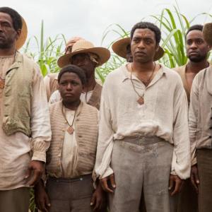 Chiwetel Ejiofor and fellow cast members in “12 Years a Slave” showing at the Lincoln Theater December 27-29 and January 1-2.