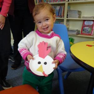 Gracie holds her chicken (above) and Devon introduces her cow. Both characters are from Doreen Cronin’s “Click Clack Moo” that was read at this week’s Story Time. Courtesy of Natalie Castonia
