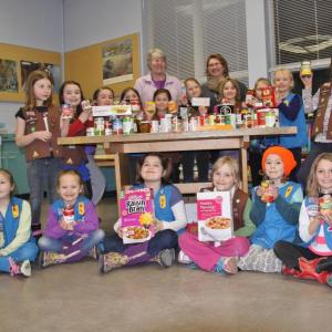 Troop 144 Scouts recently met with MaryAnn Look and Linda Blomquist of the Ecumenical Food Pantry of Newcastle to learn how the Food Pantry helps people in need. Courtesy of Mal Gormley