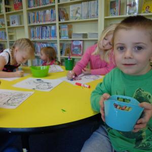 Gabe gets ready to color with the rest of the Story Time group after listening to books by Chris Van Dusen. Courtesy of Natalie Castonia