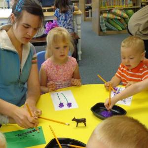 Grace and her mom work on their lupine creation. Courtesy of Natalie Castonia
