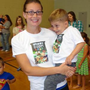 Ashley and Gabe Wood arrive at the Northern Stars finale dressed in their Fizz, Boom, Read T-shirts! Courtesy of Wiscasset Public Library