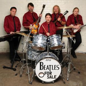 The tribute band, Beatles for Sale, performs on the Lincoln Theater stage Saturday, Sept. 6. The "Fab Five," from left: Dan Kirouac, Joe Budroe, Mike Christian, Dennis Cummins, and Steve Caisse. Courtesy of Lincoln Theater. The tribute band Beatles For Sale