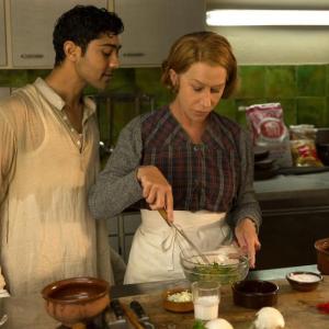 Om Puri and Helen Mirren reconcile and collaborate in a scene from “The Hundred Foot Journey," playing this week at The Harbor Theatre. Courtesy of Jason Sheckley The Hundred Foot Journey