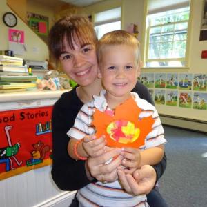 Ethan Clark gets some assistance from mom making his fall window decoration. Courtesy of WPL