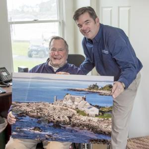 President George H. W. Bush and local photographer Dave Cleaveland in Bush's home in Kennebunkport on Oct. 7. Courtesy of Dave Cleaveland