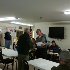 William Potter, standing, center left, receives Spirit of America Foundation Award from Chairman David A. King Sr., standing, center right. JANE CARPENTER/Wiscasset Newspaper