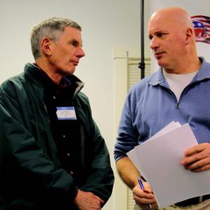 LES FOSSEL OF ALNA and LCRC Chairman Stuart Smith confer at the LCRC December meeting. Courtesy of Earl Inman