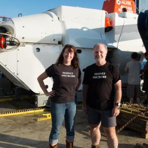 Doctors Beth Orcutt and Graham Shimmield after Alvin dive 4777. While Alvin looks quite large in the background, the total space for passengers is a sphere measuring 8 feet – much of which is taken up by equipment. Courtesy of chief scientist Geoff Wheat, Woods Hole Oceanographic Institution