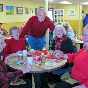 Chef Jim Brown posing with guests at the Center's 2013 Valentine's Luncheon. Courtesy of Marianne Pinkham