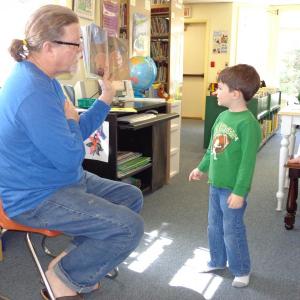 Mat O’Donnell reads "Runaway Bunny" and captures Ethan Clark’s attention. Courtesy of Natalie Castonia