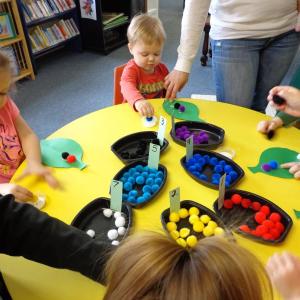 Addison West and Austin Bains create their pom-pom caterpillar with many colorful choices. Courtesy of Natalie Castonia