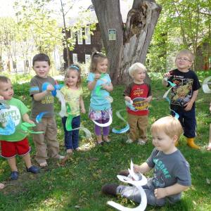 We all took our paper plate snakes outside for a “Snake Parade” in the backyard. Courtesy of Natalie Castonia