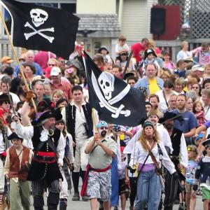 Taking the Village: Pirates of all sizes can be seen advancing on the final redoubt of the defending militia during a past Damariscotta River Pirate Rendezvous. Courtesy of Don Dunbar/easternmaineimages.com