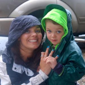 Celeste and Gavin Lincoln of Richmond battle wind and rain to attend Touch-a-Truck event at the Wiscasset Speedway on Sunday, June 28. ART MAYERS/Wiscasset Newspaper