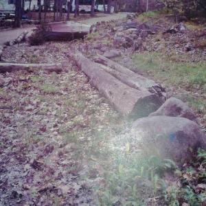 Boulders, trees and an old boat narrow Baker Road. Courtesy of Westport Selectmen