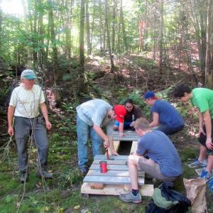 Volunteers work at the Trout Brook Preserve in Alna. Courtesy photo