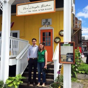 August DeLisle and Torie Van Horne stand on the steps leading up to their Damariscotta restaurant, Van Lloyd’s Bistro. SUZI THAYER/Wiscasset Newspaper
