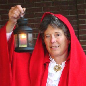 Sally Lobkowicz, the original Lady in the Red Cloak, is preparing to lead one of her lantern lit walking tours. The Lady in the Red Cloak will be making several appearances in Boothbay Harbor during Harbor Fest. Courtesy of Red Cloak Haunted History Tours Sally Lobkowicz