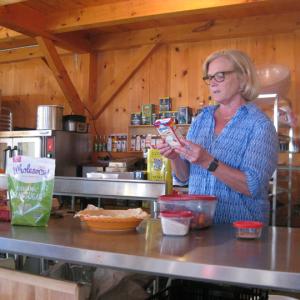 U.S. Representative Chellie Pingree teaching her "American as Apple Pie" cooking class at Nebo Lodge on North Haven Island. According to attendee Jarryl Larson, Pingree made everyone feel like members of her family. Courtesy of Lorraine Anderson