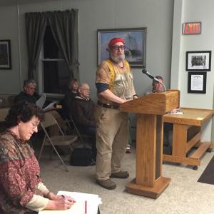 Wiscasset businessman Al Cohen addresses the Wiscasset Planning Board on Jan. 12 as resident Kathleen Bryant writes. Bryant and husband Thomas Bryant continue to appeal the board's approval of Cohen's request for a building addition to store consumer fireworks on JB's Way. File photo