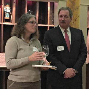 Ellen McFarland, president of the Lincoln County Animal Shelter board, left, with Tony McDonald, president of the Coastal Humane Society board. They drank a toast to the new partnership at the end of McFarland’s speech. KATRINA CLARK/Boothbay Register