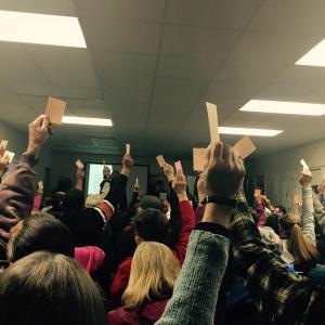 Voters raise their hands to decline the formation of a Newcastle Public Works Department on Monday, Oct. 19. Instead, the town will have to come up with an alternative, and soon, as the interlocal agreement with Damariscotta ends Oct. 31. BEN BULKELEY/Wiscasset Newspaper