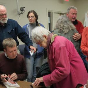 Mike Tipping, seated, signing his book "As Maine Went" for, left to right, Jim Torbert, Whitefield, April Thibodeau, Westport, Jo Cameron, Edgecomb, Nancy Bryant (back to camera) Whitefield, Jack Fitzpatrick, Bristol and Helen Marsh, South Bristol. Courtesy photo