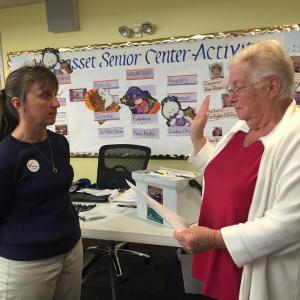 Wiscasset Town Clerk Linda Perry and newly elected Selectman Judy Colby complete the swearing-in Tuesday night.. SUSAN JOHNS/Wiscasset Newspaper