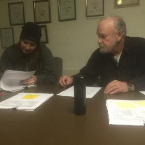 Alna Second Selectman Melissa Spinney and First Selectman David Abbott start the board’s Dec. 2 meeting with Third Selectman Doug Baston on a town office phone, which Town Clerk Amy Warner placed on the table. Baston was out of town that night. SUSAN JOHNS/Wiscasset Newspaper