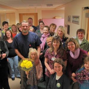 LincolnHealth Emergency Department Nurse Eric Duffy (center) received the first DAISY Award presented by LincolnHealth Dec. 3 in a surprise ceremony attended by his wife, Kelly Duffy, and daughters Helen and Fiona, as well as his parents, Christine Duffy and Gordon Isleib. Courtesy of LincolnHealth