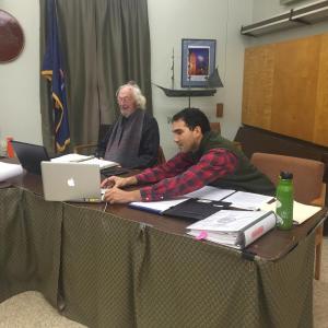 Wiscasset Historic Preservation Commission Chairman John Reinhardt, left, prepares to start business Dec. 3 as Town Planner Jamel Torres adjusts the position of a laptop for commission member Jib Fowles to participate via Skype. SUSAN JOHNS/Wiscasset Newspaper