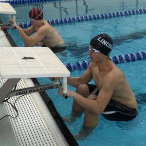 Eagle Tommy Thelander gets ready to battle Daren Wood of Wiscasset in the boys 100-yard backstroke event on Dec. 22. Thelander took first place with a state qualifying time of 1:12.41. KATRINA CLARK/Wiscasset Newspaper