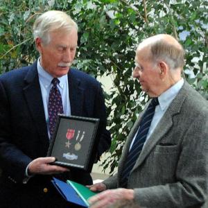 Senator King presents Joseph Hoerth with several medals he earned for his service during World War. Courtesy photo
