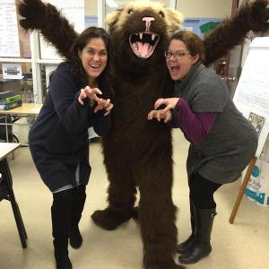 From left, WMHS teachers Stacylynn Rouleau, Tricia Bursey in mascot costume and Katie Loubier show their Wolverine spirit as WGME’s Spirit Challenge continues. Courtesy of Deb Pooler
