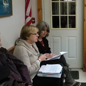 Westport History Committee co-chairmen Mary Coventry and Gaye Wagner address the selectmen as Fire Chief Bob Mooney observes. JANE CARPENTER/Wiscasset Newspaper