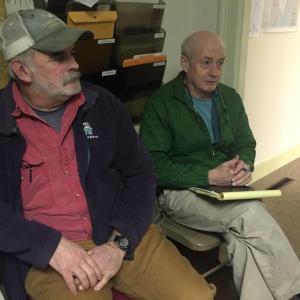 Head Tide Dam Committee member Greg Shute, left, listens as Atlantic Salmon Federation Vice President of U.S. Programs Andy Goode, right, addresses Alna selectmen Feb. 24. SUSAN JOHNS/Wiscasset Newspaper