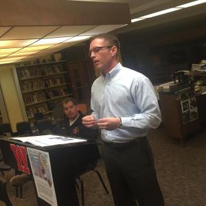 Tom Seekins of Siemens addresses the Wiscasset School Committee Jan. 28 in the Wiscasset Middle High School library. Transportation and Maintenance Director John Merry looks on. SUSAN JOHNS/Wiscasset Newspaper