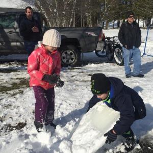 Danika Osmond, 8, and Camden Larrabee, 9, have fun at Winterfest Feb. 6. SUSAN JOHNS/Wiscasset Newspaper