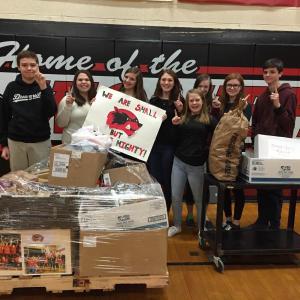 Wiscasset Middle High School students prepare for Good Shepherd Food Bank’s final Wiscasset food pick-up on Monday, March 1. Pictured in front is Maeve Blodgett. Back row, from left, are Ben Masten, Corey Campbell, Lindsey Gordon, Vanessa Dunn, Grace Webber, Sarah Foley and Jesse Perkins. Courtesy of Deb Pooler