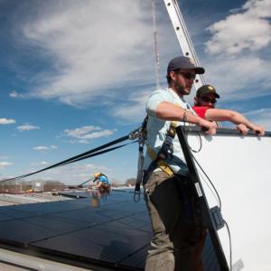 ReVision Energy workers install some solar panels. Courtesy photo