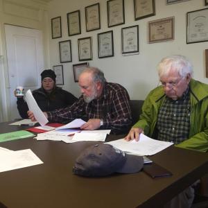 From left, Alna Second Selectman Melissa Spinney, First Selectman David Abbott and Third Selectman Doug Baston prepare to start the board’s April 20 meeting. SUSAN JOHNS/Wiscasset Newspaper