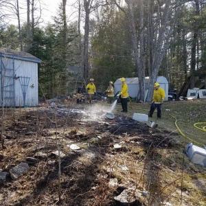 Firefighters work at the scene of a Woolwich woods fire April 16. Courtesy of Michael Demers of Woolwich Fire and Rescue