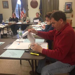 Wiscasset Budget Committee member John Merry, fellow committee members and selectmen take part in budget talks April 4. SUSAN JOHNS/Wiscasset Newspaper