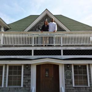 Chef Kelly Farrin and his partner, and future wife, Sasha Morin, stand on the deck of their new business, Carriage House Restaurant, in East Boothbay. SUZI THAYER/Boothbay Register